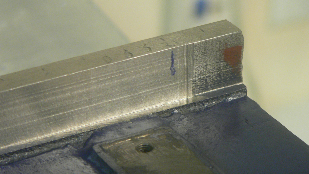 End of front side of bed showing serial number 33